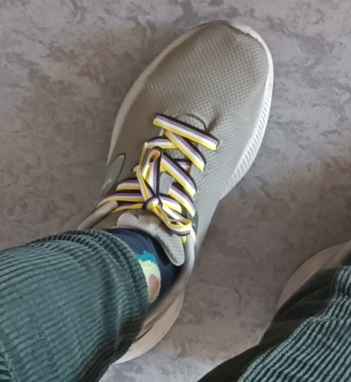 a photo of my foot wearing a shoe and those shoelaces